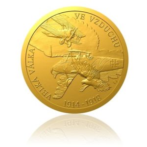 Zlatá mince s vyobrazením ukončení 1 světové války ve vzduchu